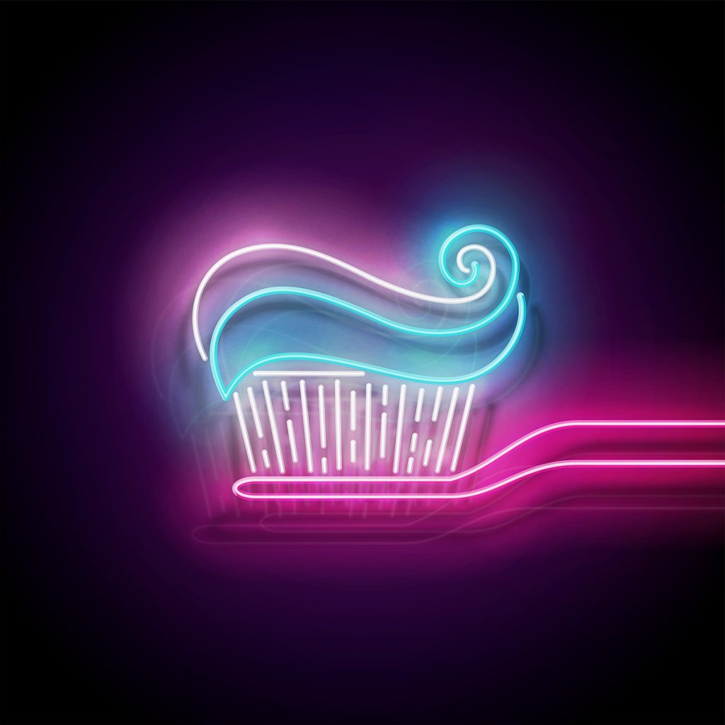 glow toothbrush with toothpaste, personal hygiene